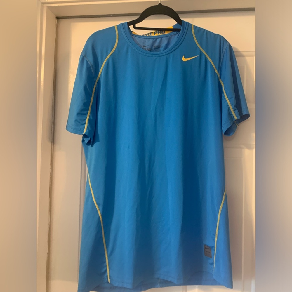 Men’s blue and yellow Nike dri-fit shirt size L